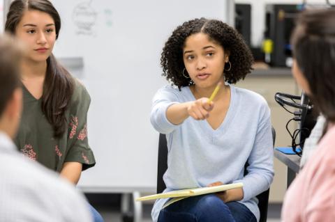 student in discussion group