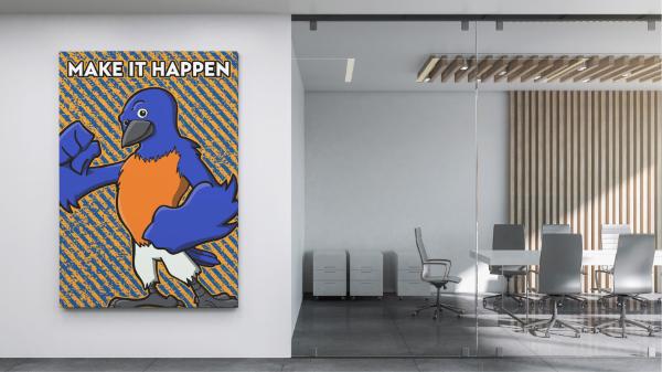 Image of an office with a poster of the mascot Blue. 