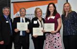 Left to right: Northeast Center Dean Gerry Lorentz, students Russell Riddell, Agnes Zink, Cheryl Schiemer and Acting President Meg Benke at the center’s student recognition ceremony.