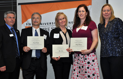 Left to right: Northeast Center Dean Gerry Lorentz, students Russell Riddell, Agnes Zink, Cheryl Schiemer and Acting President Meg Benke at the center’s student recognition ceremony.