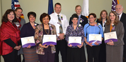 Left to right, Robin Bartlett, chartering officer, STTI, Jennifer Pettis, Mary K. Sweeney, Lisa Moruzzi, Geraldine Vickers and Rosemary Casale. Back left to right,Empire State College President Merodie Hancock, David Theobald, Gregory B. Pieper, Deborah Elliott and Excelsior College President John Ebersole.