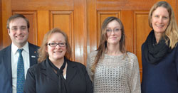 Charles Wait Jr. stands at left with students and 2014-15 Adirondack Trust Co. scholarship recipients Alison Helm and Kendra Pelham. President Merodie Hancock also was on hand for the recognition event held at the college's Alumni House.