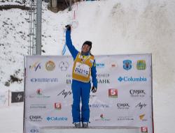 Ashley Caldwell '14 raise the FIS World Cup. Photo/USSA / Greg Heuer