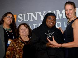 Left to right: Sandra Barkevich, Pat Myers, Layla Abdullah-Poulos and President Merodie Hancock