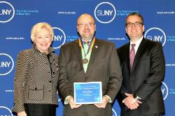 Chancellor Nancy Zimpher, student Scott DeBrucker and Vice Provost Tom Mackey