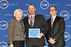 Chancellor Nancy Zimpher, student Scott Rachon and Vice Provost Tom Mackey