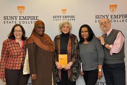 Left to right are Associate Dean Cathy Leaker, graduate student Layla Abdullah-Poulos ‘10, Professor Elena Michelson, graduate student Tanya Rice Thompson ’14, and Professor Alan Mandell at the 2016 celebration of experiential learning. 