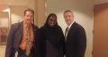 Layla Abdullah-Poulos, president of the college's Minority Students in Action club, with Deputy Inspector Mark Magrone, commander of the NYPD Hate Crime Task Force, left, and Sergeant Kevin Lonergan, right, at the college's recent forum on hate crime.