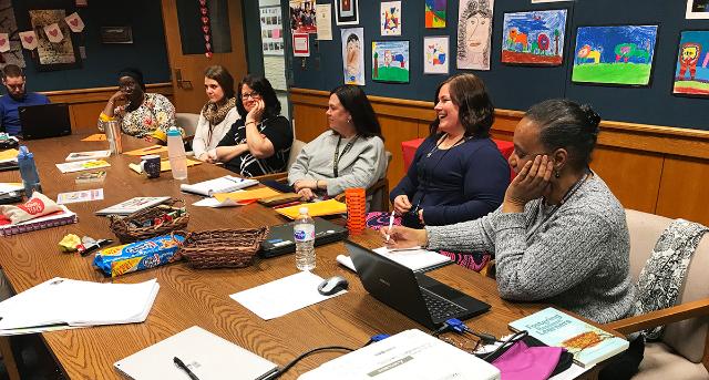 School for Graduate Studies Professors Patricia Isaac, far right, and Donna Mahar, not shown, met with Van Duyn Elementary School teacher to present “Trauma and Literacy.