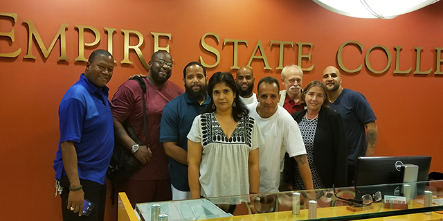 From left to right are Professor David Fullard, program participants Qwiheim Marina and Irving Barrero, Professor Dianne Ramdeholl, program participant Job Rodriquez, adjunct faculty member Barbara Tischler and Professor Steve Tischler, and program participant Rene Perez at SUNY Empire State College’s 325 Hudson Street location in Manhattan.