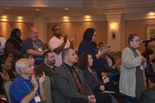 Students wait for their turn to ask questions at the 2015 Student Academic Conference Town Hall.